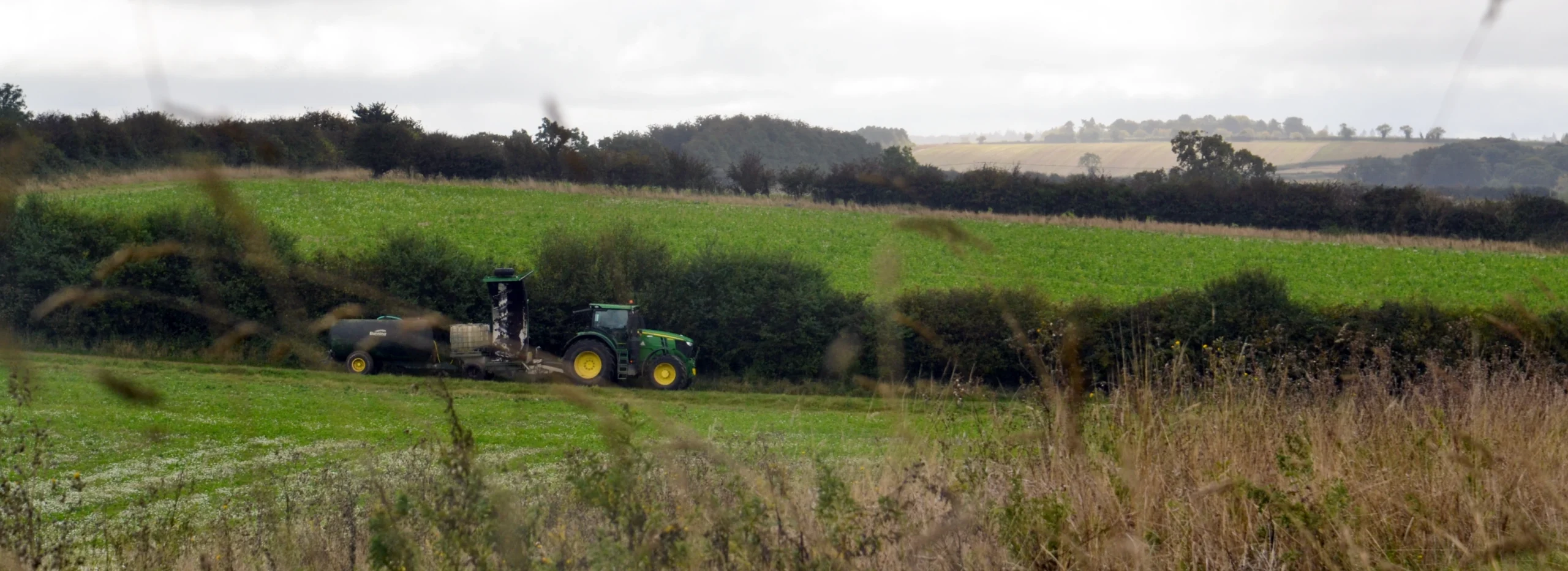 A tractor in the landscape at Wild Ken Hill